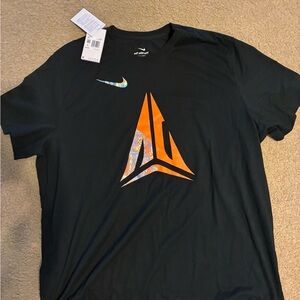 Nike Men's Black T-Shirt with Orange Logo